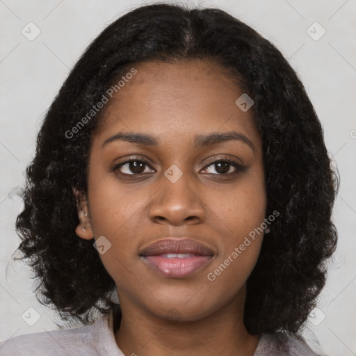 Joyful black young-adult female with medium  black hair and brown eyes