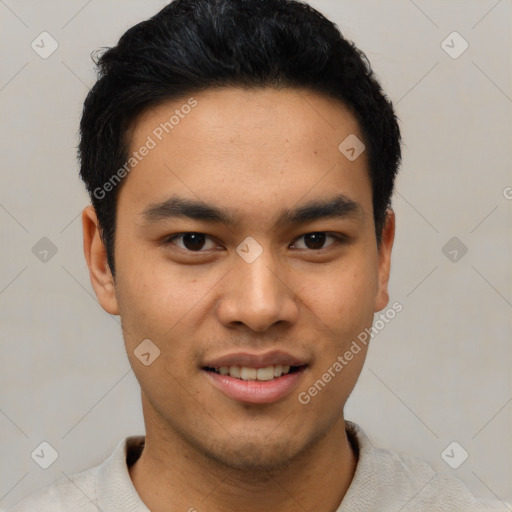 Joyful asian young-adult male with short  black hair and brown eyes