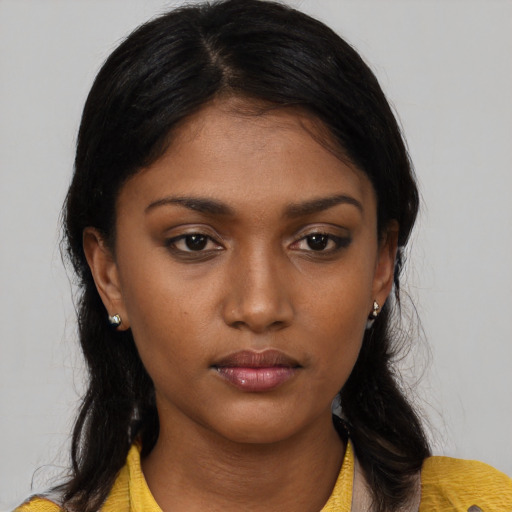 Neutral latino young-adult female with long  black hair and brown eyes