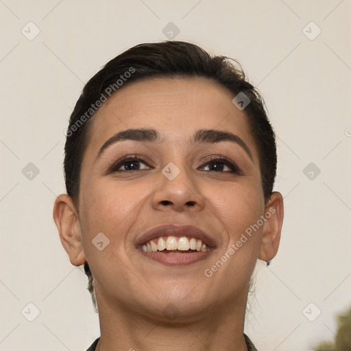 Joyful white young-adult female with short  brown hair and brown eyes