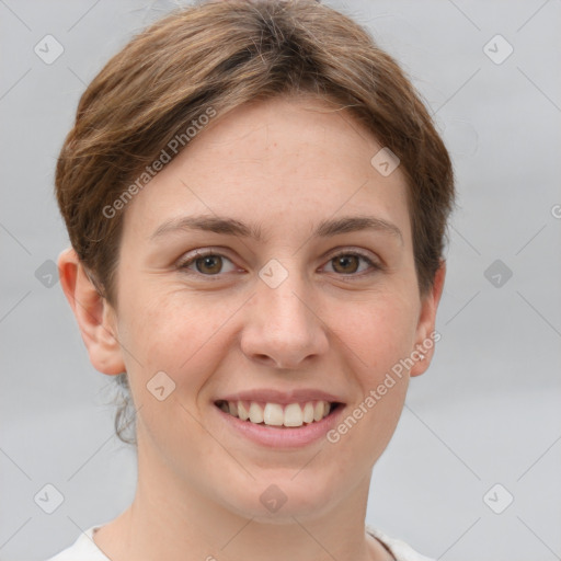 Joyful white young-adult female with short  brown hair and grey eyes