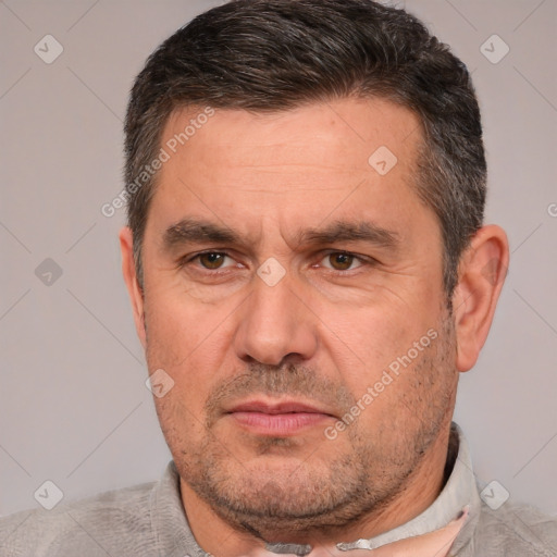 Neutral white adult male with short  brown hair and brown eyes