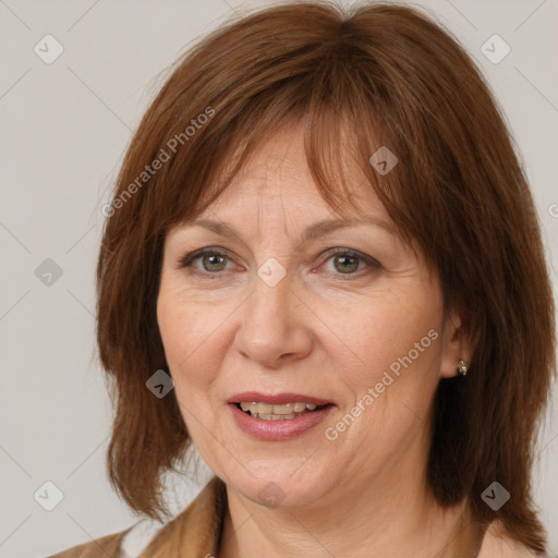 Joyful white adult female with medium  brown hair and brown eyes