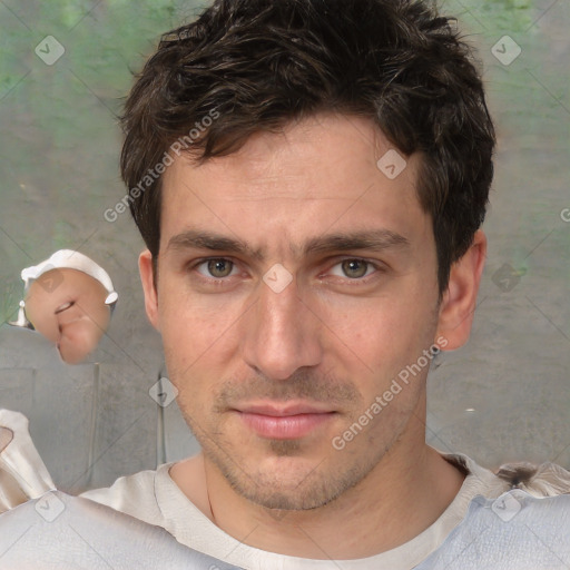 Joyful white adult male with short  brown hair and brown eyes