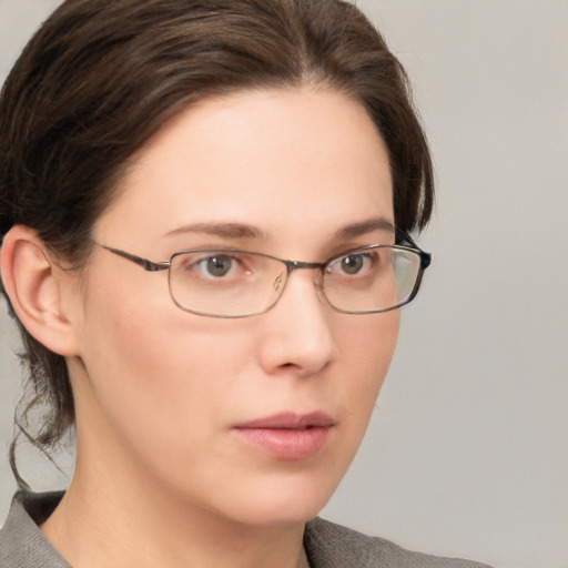 Neutral white young-adult female with medium  brown hair and grey eyes