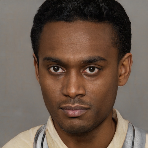Neutral black young-adult male with short  black hair and brown eyes