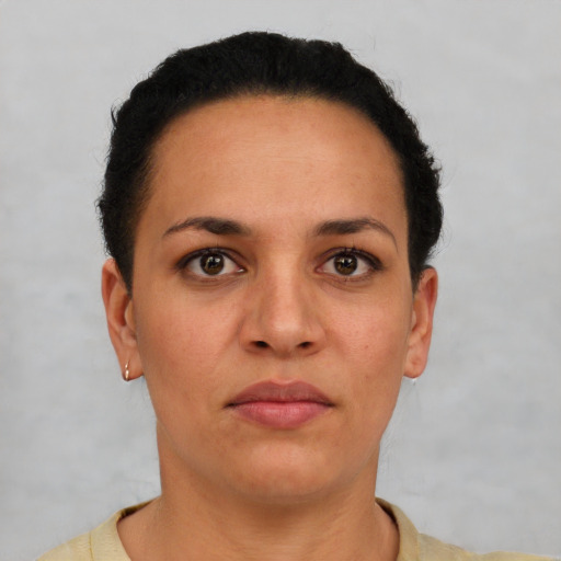 Neutral latino young-adult female with short  brown hair and brown eyes