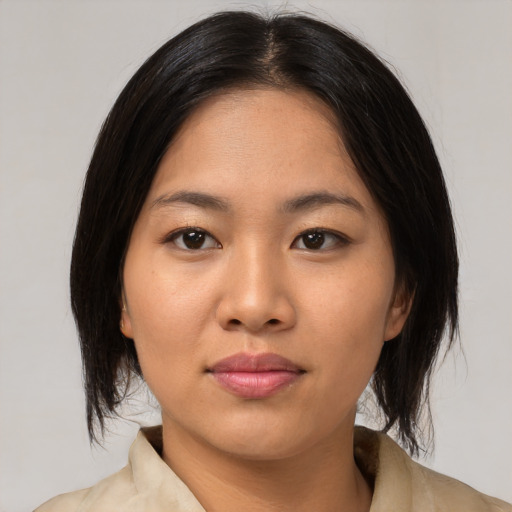 Neutral asian young-adult female with medium  black hair and brown eyes