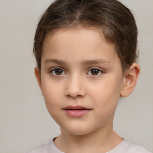 Neutral white child female with short  brown hair and brown eyes