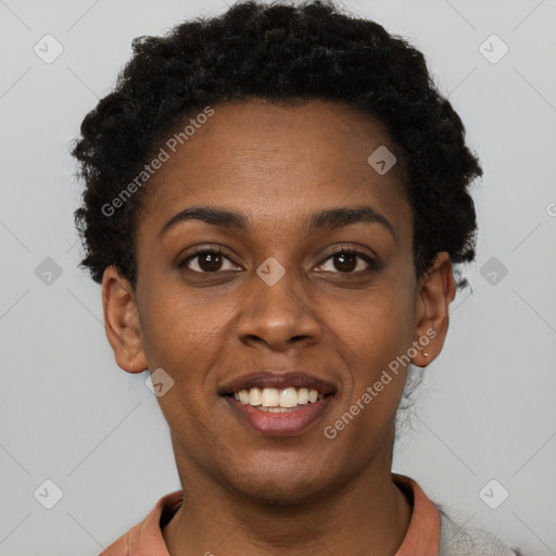 Joyful black young-adult female with short  brown hair and brown eyes