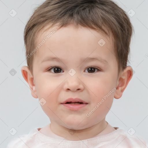 Joyful white child male with short  brown hair and brown eyes