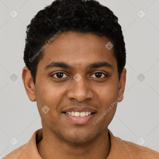 Joyful black young-adult male with short  black hair and brown eyes
