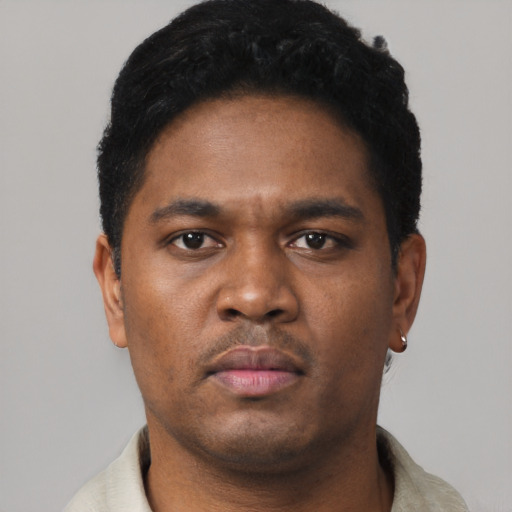 Neutral black young-adult male with short  black hair and brown eyes