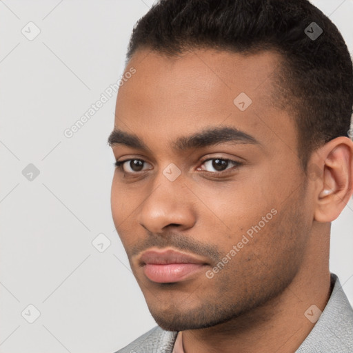 Neutral white young-adult male with short  black hair and brown eyes