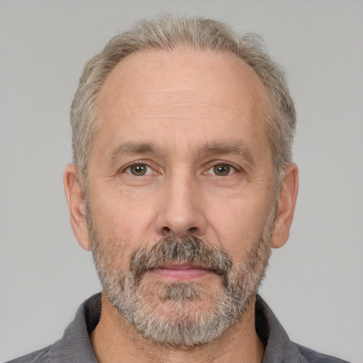 Neutral white middle-aged male with short  gray hair and brown eyes