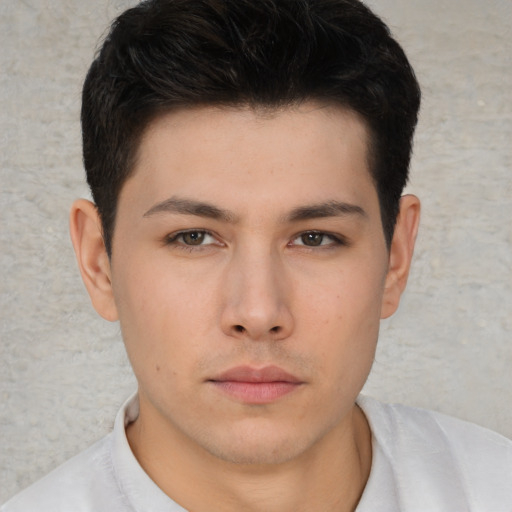 Neutral asian young-adult male with short  brown hair and brown eyes