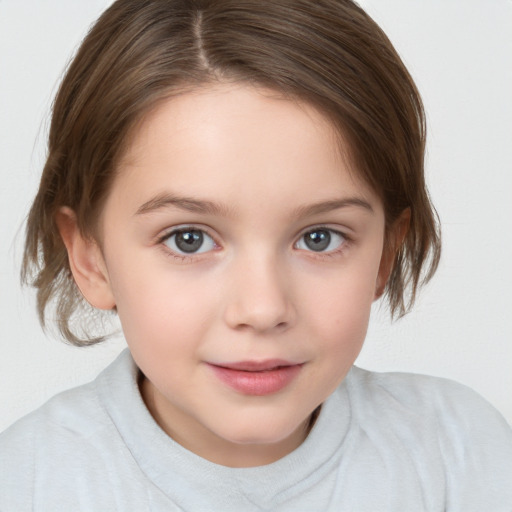 Joyful white child female with medium  brown hair and brown eyes