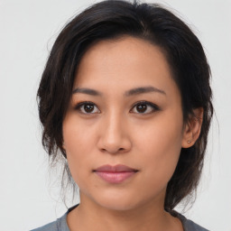 Neutral asian young-adult female with medium  brown hair and brown eyes