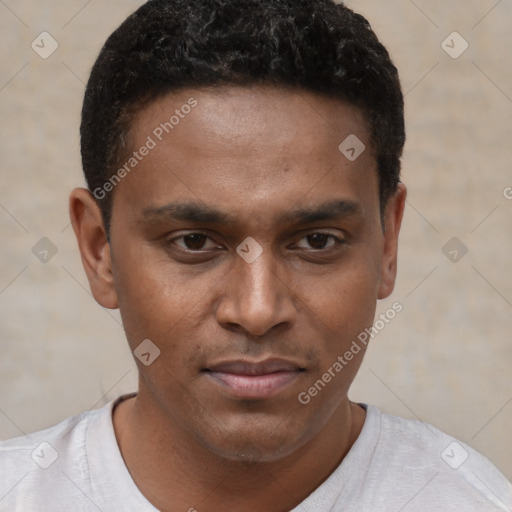 Joyful black young-adult male with short  brown hair and brown eyes