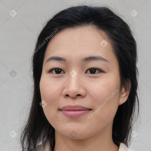 Joyful asian young-adult female with medium  brown hair and brown eyes