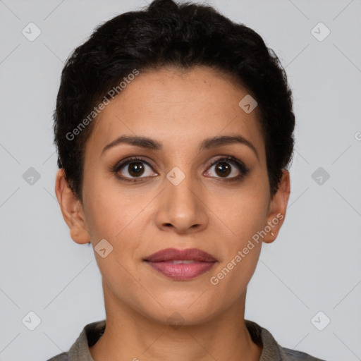 Joyful latino young-adult female with short  brown hair and brown eyes