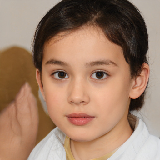 Neutral white child female with medium  brown hair and brown eyes