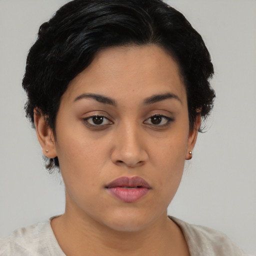 Neutral latino young-adult female with short  black hair and brown eyes