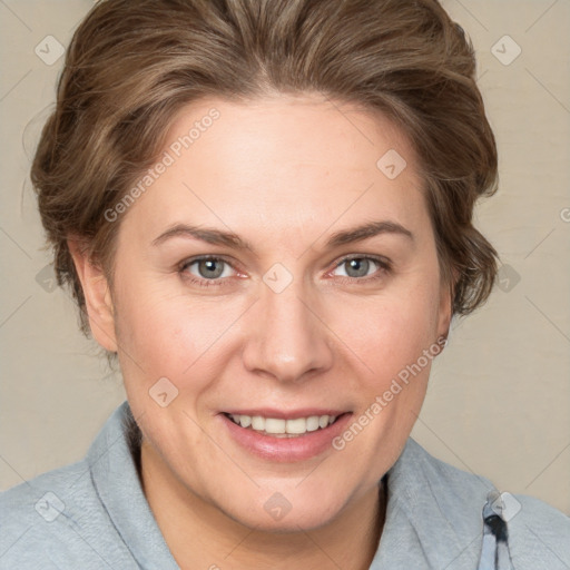 Joyful white adult female with medium  brown hair and grey eyes