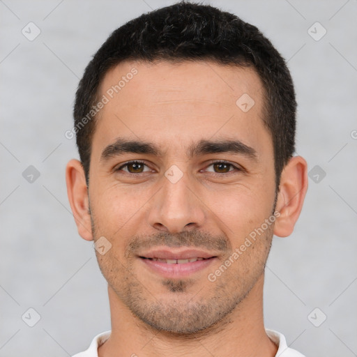 Joyful white young-adult male with short  brown hair and brown eyes