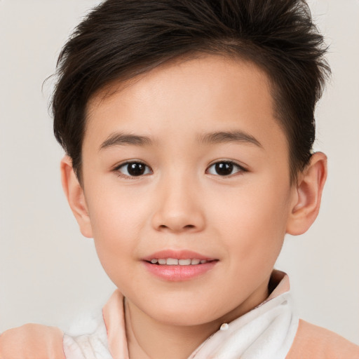 Joyful white child female with short  brown hair and brown eyes