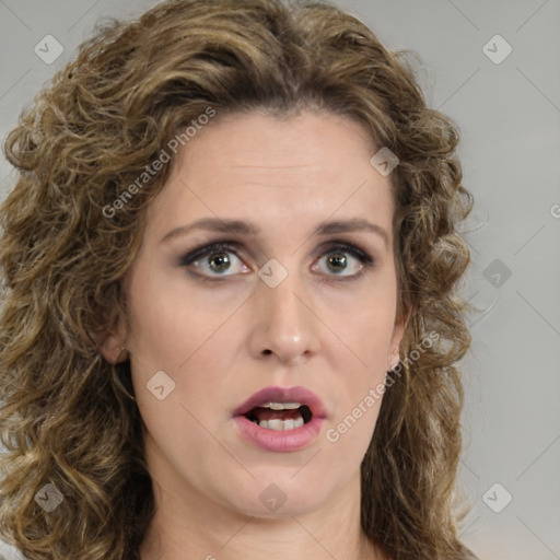 Joyful white young-adult female with medium  brown hair and green eyes