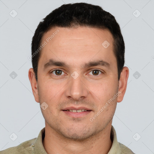 Joyful white young-adult male with short  brown hair and brown eyes