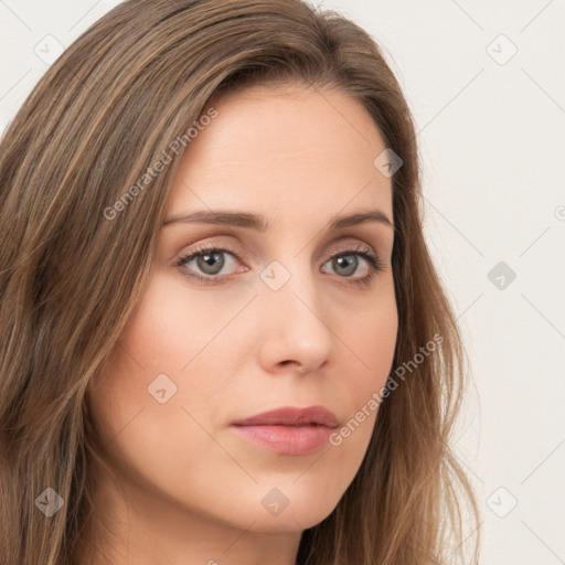 Neutral white young-adult female with long  brown hair and brown eyes