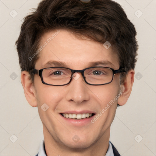 Joyful white adult male with short  brown hair and grey eyes