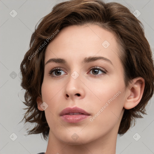 Neutral white young-adult female with medium  brown hair and brown eyes