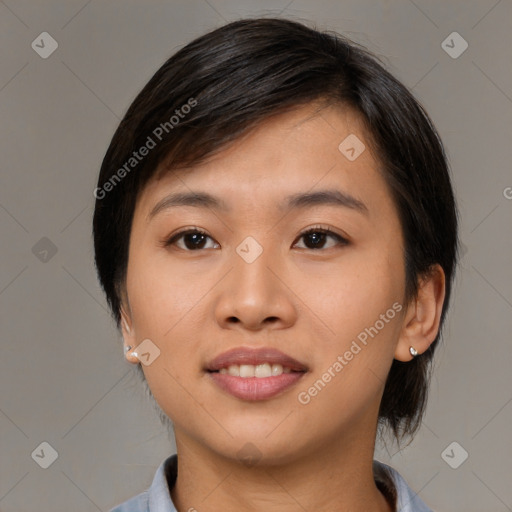 Joyful asian young-adult female with medium  black hair and brown eyes