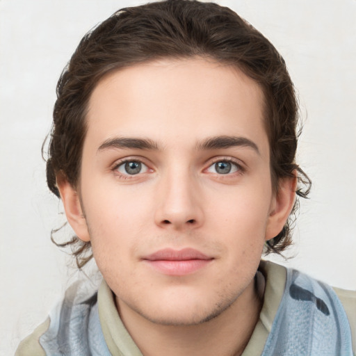 Neutral white young-adult male with medium  brown hair and brown eyes