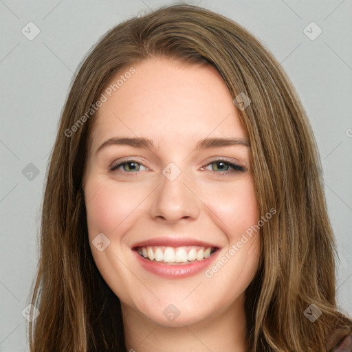 Joyful white young-adult female with long  brown hair and green eyes