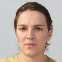 Neutral white young-adult female with short  brown hair and brown eyes