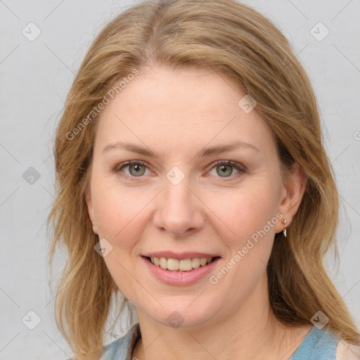 Joyful white young-adult female with medium  brown hair and blue eyes