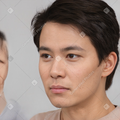 Neutral asian young-adult male with short  brown hair and brown eyes