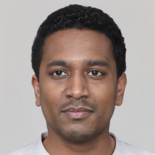 Neutral black young-adult male with short  black hair and brown eyes