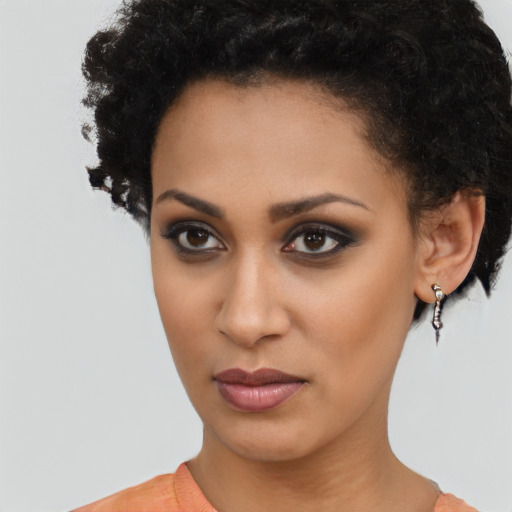 Neutral latino young-adult female with short  black hair and brown eyes