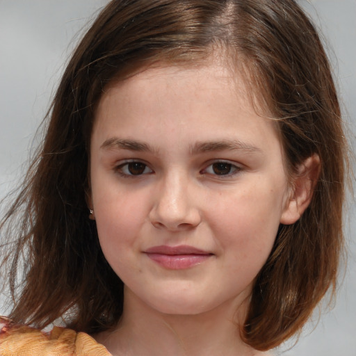 Joyful white child female with medium  brown hair and brown eyes