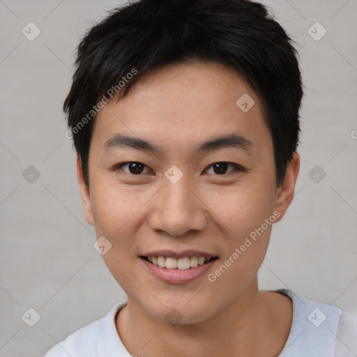 Joyful asian young-adult male with short  black hair and brown eyes