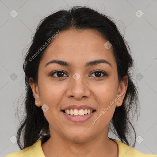 Joyful latino young-adult female with medium  brown hair and brown eyes