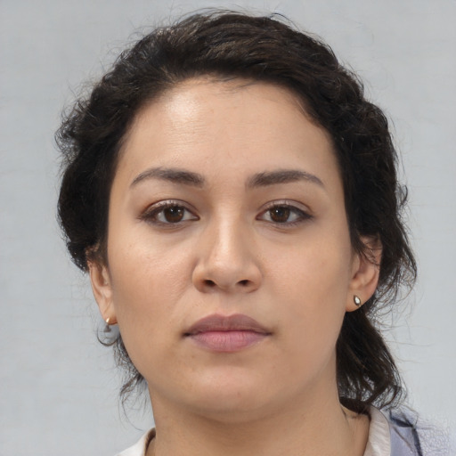 Neutral white young-adult female with medium  brown hair and brown eyes