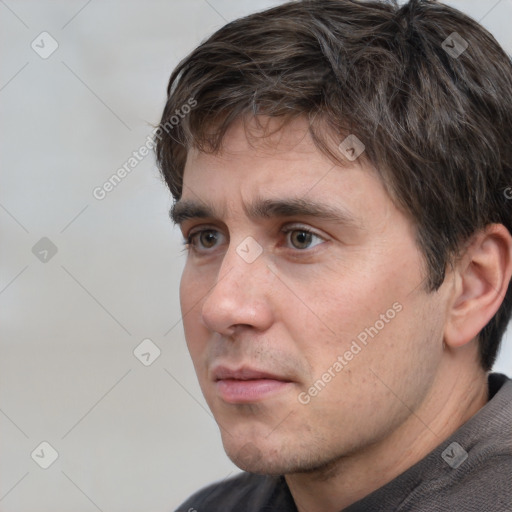 Neutral white adult male with short  brown hair and brown eyes