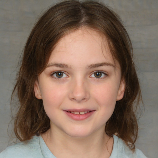 Joyful white child female with medium  brown hair and brown eyes