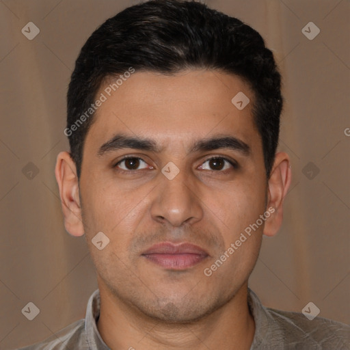 Joyful latino young-adult male with short  brown hair and brown eyes